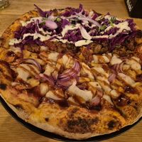Half Hawaiian summer, half Doner pizza at Virtuous Pie in Cologne