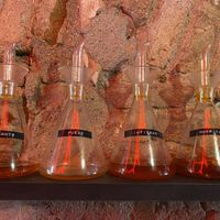 Different grade of spicy oils  at El Vato Loco in Barcelona