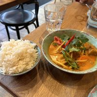 Red curry with veg and tofu. Ordered with jasmine rice.   at Rosa's Thai Cafe - Finsbury Park in North London