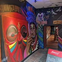 The entrance with graffiti at La Hamburgueseria in Bogota
