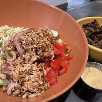 Make your own bowl w/ bbq jackfruit, romaine, pineapple slaw, avocado, cucumber, tomato, grilled onions (slightly too undercooked) with Cajun remoulade.  at devil's lettuce in Richmond
