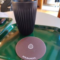 Coffee mug and cute coaster at Solbangul Bakery 솔방울베이커리 in Seoul