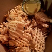 Waffle fries with cheese dip at Tattooed Mom in Philadelphia
