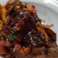 BBQ Jackfruit Stuffed Sweet Potato at Harvest Market in Springfield