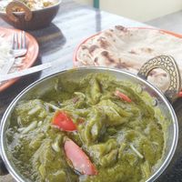 Curry with potatoes and spinach with roti and rice at Shankara Vegis in Agra