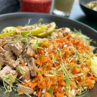 Tofu plate with fresh figs and sprouts at Ecolonco Greenshop in Lisbon