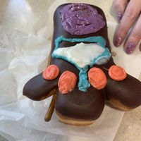 voodoo doll!!! there’s raspberry filling!!!   at DEN - Voodoo Doughnut - Concourse B in Denver