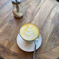 Golden latte 🫶  at Full Circle Coffee in Ghent