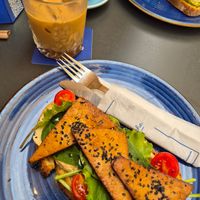 Toast with tofu, iced latte oatmilk at Mala Leche in Malaga