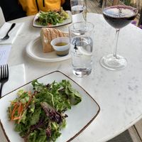 Salad and bread at Italian night at Sadie Cooks Plants in Seattle