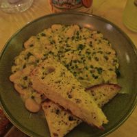 Leak and butter bean Casserole and garlic bread at Nooch Bar and Kitchen in Stirling