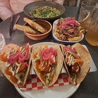 Tempeh tacos, bean stew, and haggis loaded fries at Nooch Bar and Kitchen in Stirling