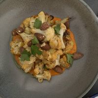 Roast cauliflower with romesco sauce & smoked almonds  at Nooch Bar and Kitchen in Stirling