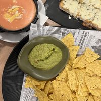 Salmorejo, nachos with guacamole, pan de ajo with cheese  at Karpanta in Sevilla