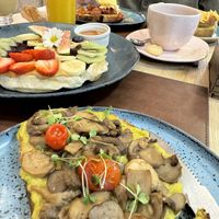 Avocado Toast with Mushrooms and Sweet Waffle (Hondy on the side)   at Nusa Café in Rio De Janeiro