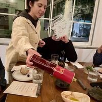 Thalia was our oil sommelier and the one she was pouring was my favorite!! Grassy.  at Panigyri Festival Food in Santorini