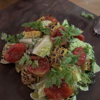 Grilled corn and tomato salad  at Panigyri Festival Food in Santorini