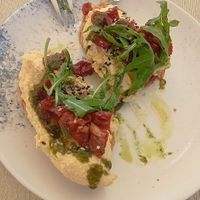 Tosta vegana y sin gluten de humus y tomate seco. at El Curry Verde in Hondarribia