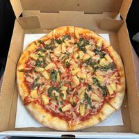 Vegan pizza with pineapple and basil at Brooklyn Pizza Company  in Seminole