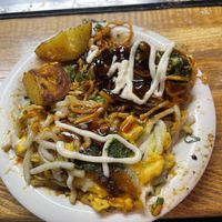 Mix of vegan okonomiyaki, jirokichi roll and garlicky potatoes with vegan oko sauce and vegan mayo   at Jirokichi - / 次郎吉 in Hiroshima