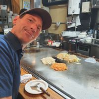 Waiting for 2 vegan Okonomiyaki. One with spicy ramen, one with udon. at Jirokichi - / 次郎吉 in Hiroshima