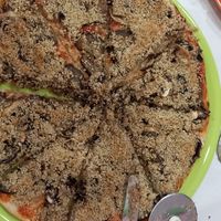 Pizza parmesana. at Mundo Vegan in Barcelona