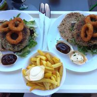 Vegan junk food burgers with fries and vegan mayo at Jetties in Haarlem