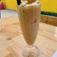Special mixed smoothies - banana, orange and coconut milk at Bahn Mi Tron - CircleT in Ninh Binh