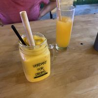 Good orange juice and mango smoothie with coconut milk  at Bahn Mi Tron - CircleT in Ninh Binh