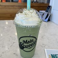 Frozen Matcha with non dairy whip and a scoop of pea protein 😍  at Main Squeeze Juice Co in Jacksonville Beach