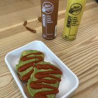 Spicy toast, heavy on the garlic spicy sauce  at Main Sqeeze Juice Co in Mandeville