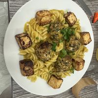 Cauliflower and quinoa meatballs and tofu in Thai coconut saucee  at My Organic Corner in Weston