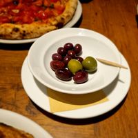 "three kinds of olives" (that was the whole portion) at Trattoria Pizzeria & Bar LOGIC in Nagano