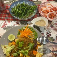 Fried morning glory, fried glass noodle soy sauce with tofu and Tomato - Onion salad at Chai Thaifood in Phuket