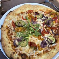 Mediterranean vegetable pizza with vegan cheese  at The Quiet Site in Penrith