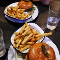 Vegan burgers with chips. at V Rev Vegan Diner in Manchester