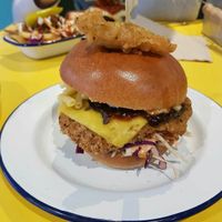 Burger with mc and Cheese in it at V Rev Vegan Diner in Manchester
