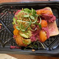 Avocado toast (it got a little smushed after I carried it back to my hotel).  at Usina Cafetera  in Buenos Aires