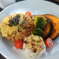 Abóbo
ra grelhada com empanado vegano com creme de milho e alho confit. at Odoiá Maragogi Estalagem e Restaurante in Maragogi