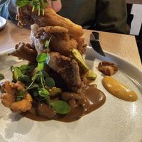 Fried oyster mushrooms, savory waffle, koji gravy 😋 at The Acorn in Vancouver