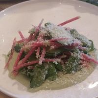 Sumac Lemon Dressed Snap Peas, Cucumber Cashew Créme Fraiche, Wild Greens, Pickled Cucumber, Shaved Hazelnut * at The Acorn in Vancouver