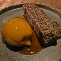 Peach sorbet and pretty dry, crumbly cornmeal cake at The Acorn in Vancouver