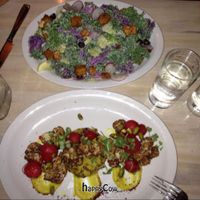 Large kale salad and Roasted radish entree at The Acorn in Vancouver