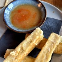 Crispy Tofu but already partly eaten. So eager; sorry!  at Ditto in Te Anau