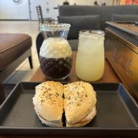 Everything bagel with vegan cream cheese! (Pretty sure it's violife) With a nitro cold brew and a lemonade😄 at Smokestack Roasters in Lunenburg
