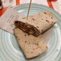Piadina integrale al seitan, mozzarella di riso, funghi, zucchine e pomodorini at Otivm Bar in Padua