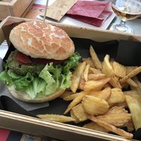 Veggie burger (vegan) and fries  at Otivm Bar in Padua