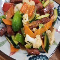 Seasonal vegetables with 'pork' belly at Vegelicious in Cheltenham