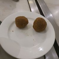 Millet Churma laddu two pieces at Millets of Mewar - City Palace Rd in Udaipur
