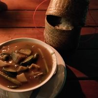 Tofu 'Or Lam' stew, with a basket of sticky rice at Green Restaurant in Vang Vieng